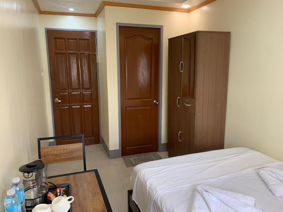 Zl Travelers Inn Batuan 外观 照片