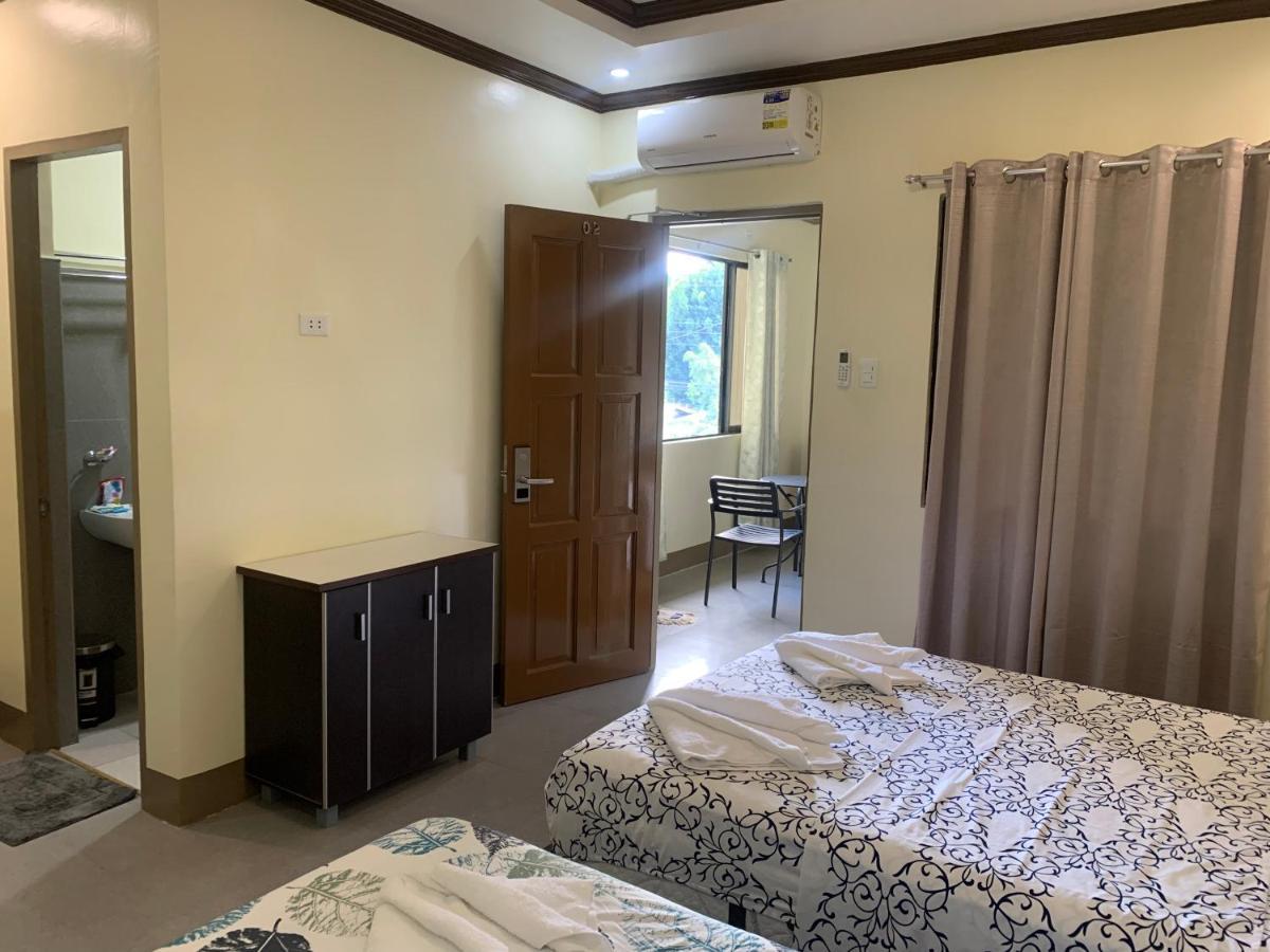 Zl Travelers Inn Batuan 外观 照片