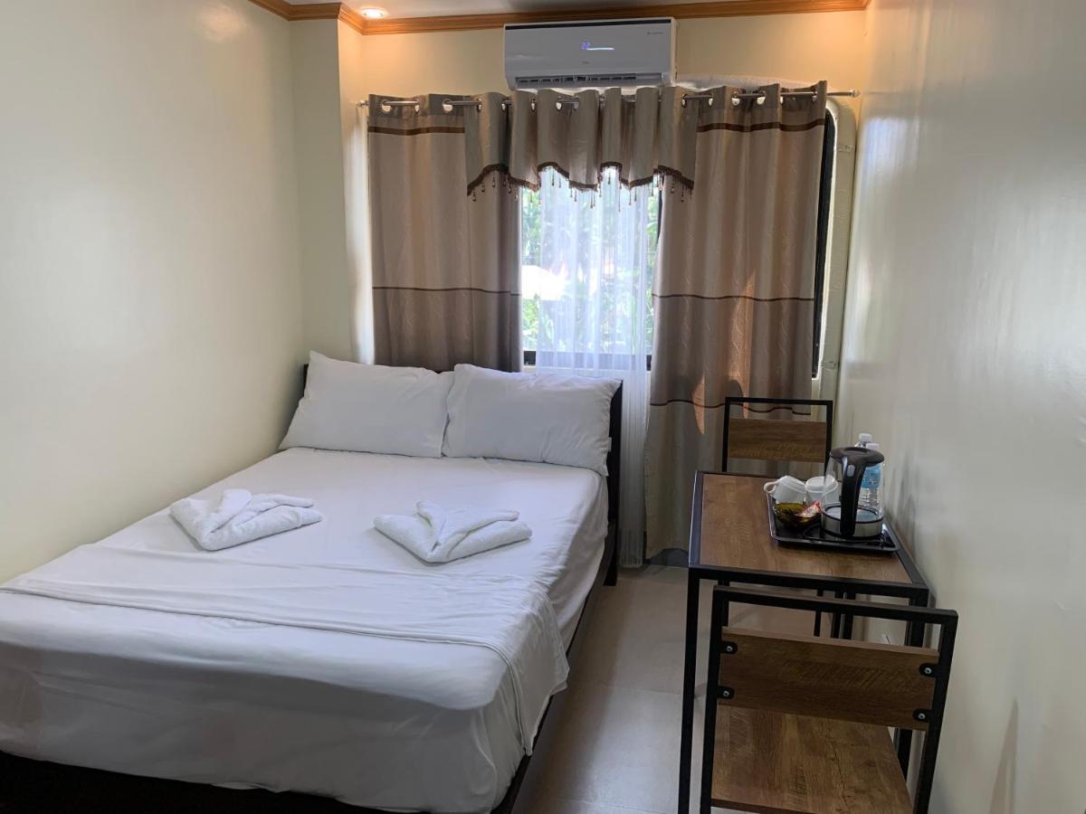 Zl Travelers Inn Batuan 外观 照片