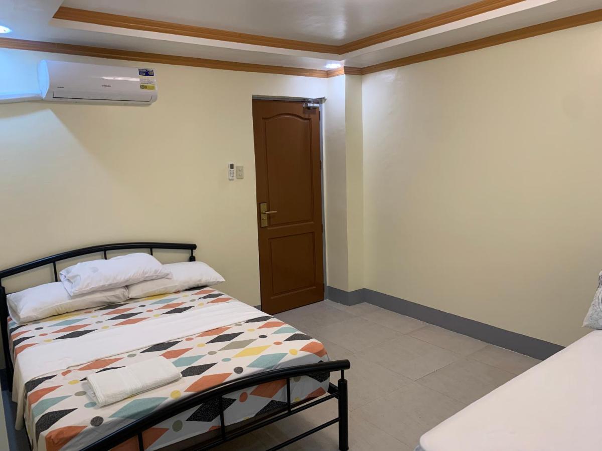 Zl Travelers Inn Batuan 外观 照片