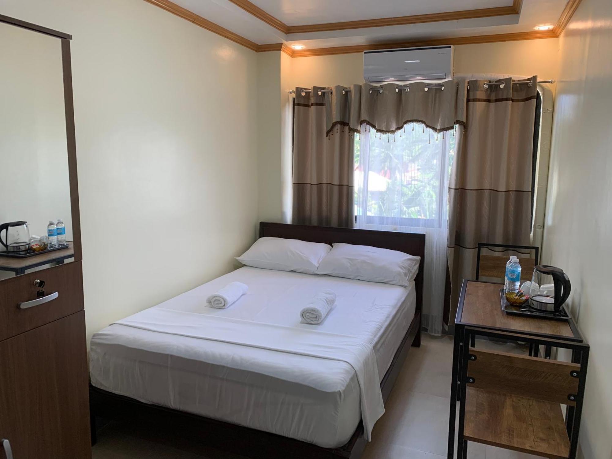 Zl Travelers Inn Batuan 外观 照片