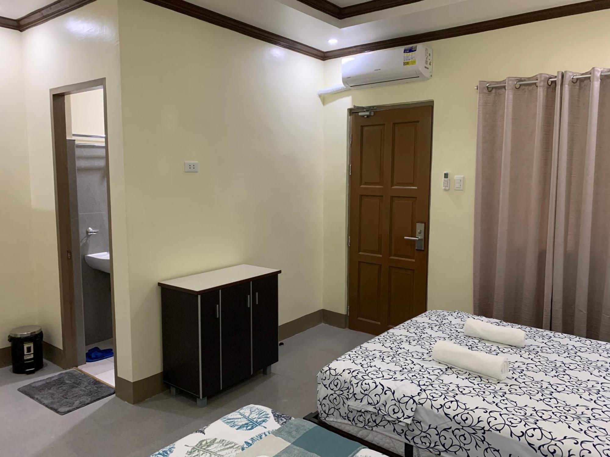 Zl Travelers Inn Batuan 外观 照片