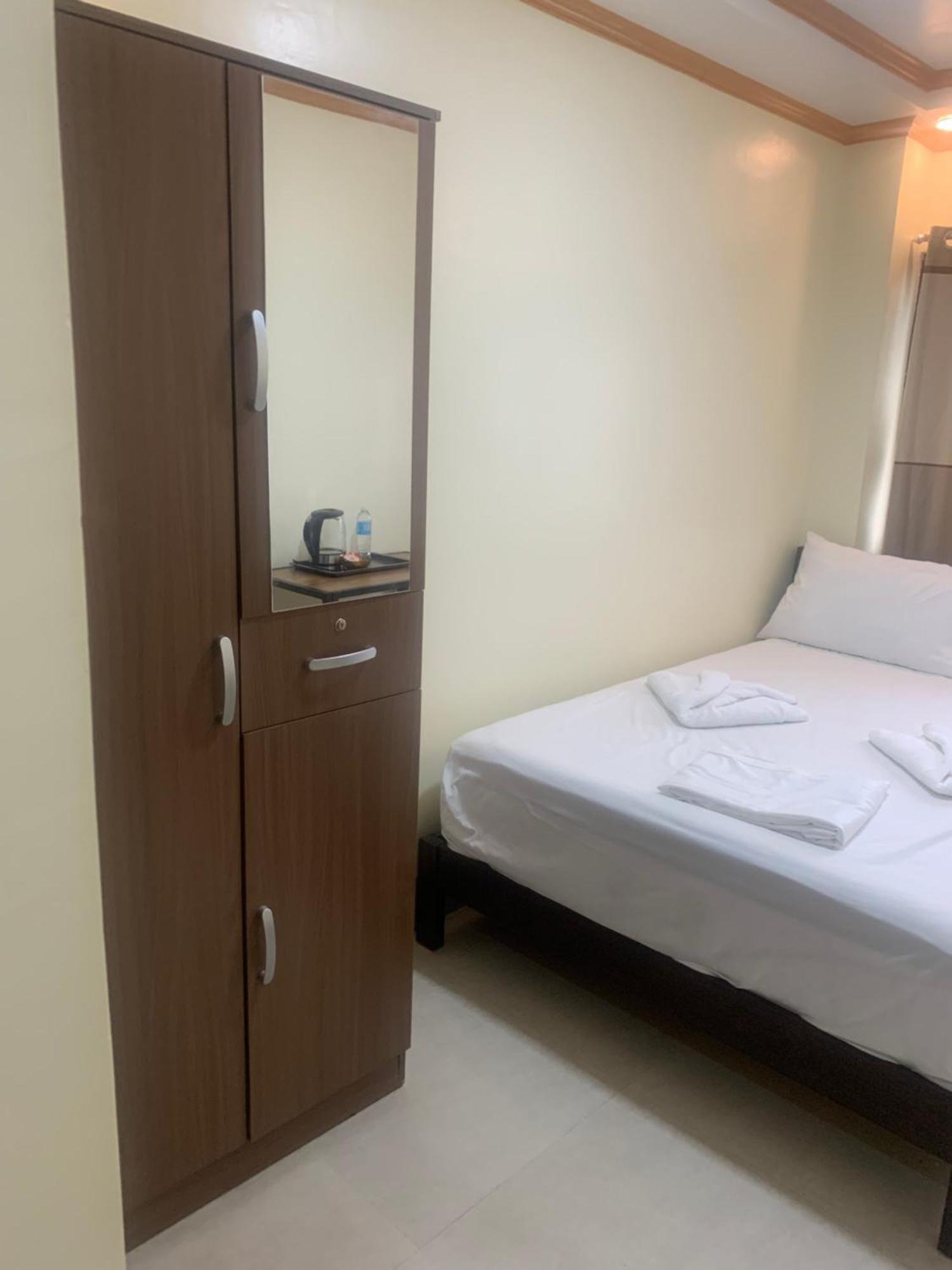 Zl Travelers Inn Batuan 外观 照片