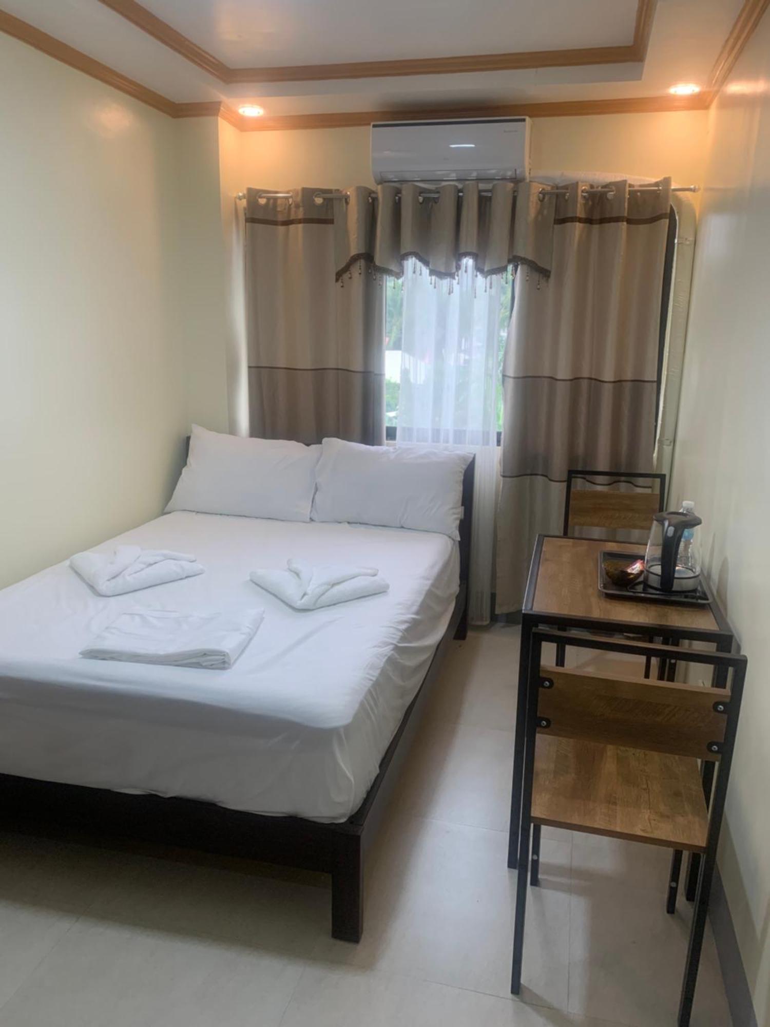 Zl Travelers Inn Batuan 外观 照片